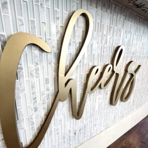 gold cheers sign