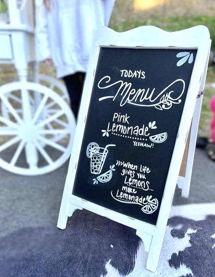 white chalkboard sign